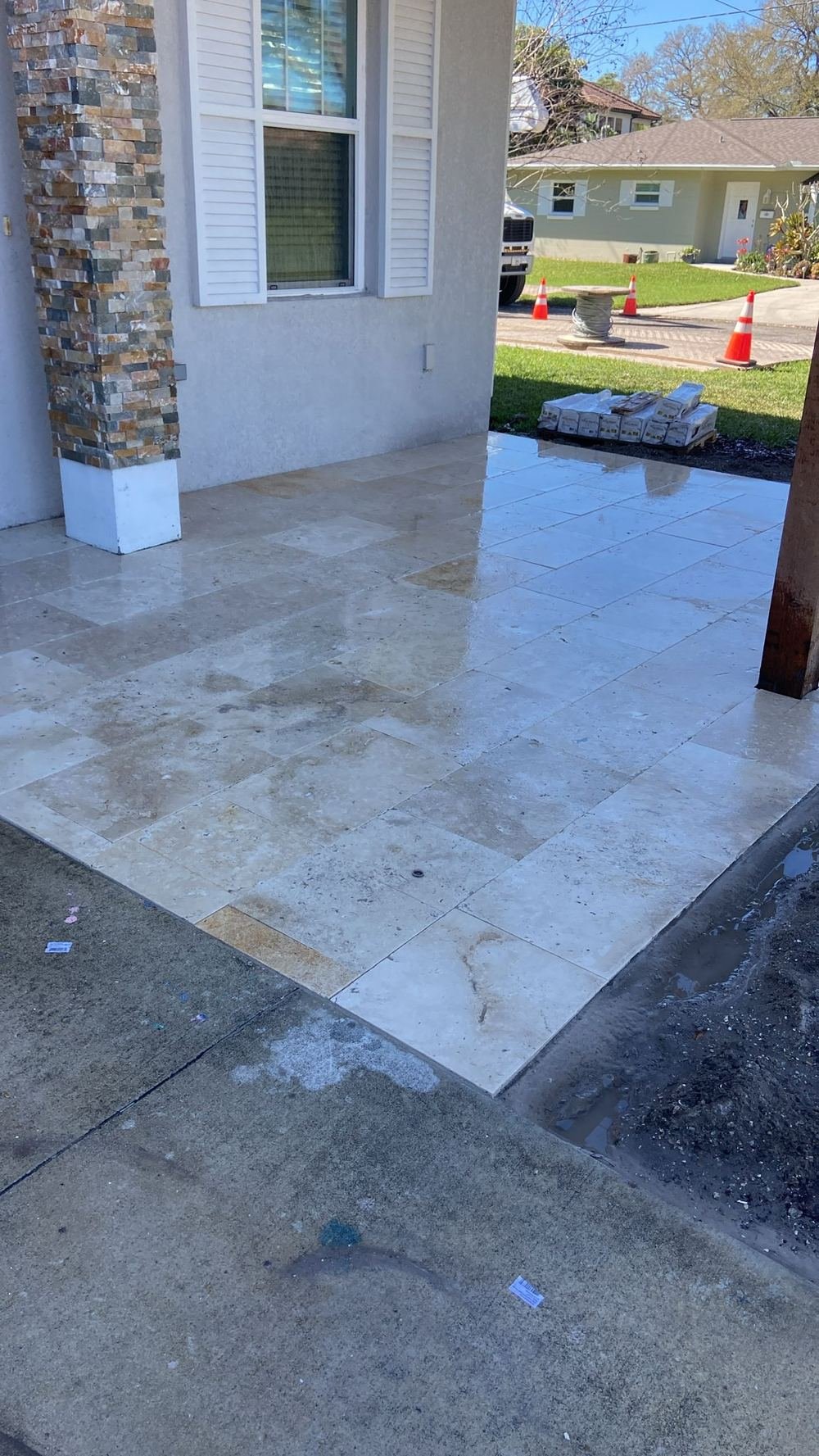 Travertine paver front porch installation